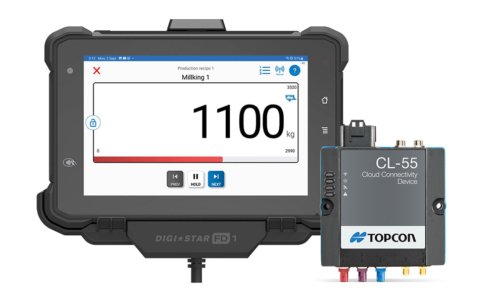 Monitor vážního terminálu Digi-Star FD 1 vedle komunikační jednotky Topcon CL-55.